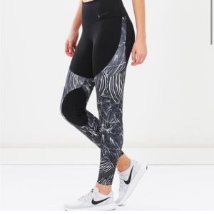 - NWOT nike feather leggings
